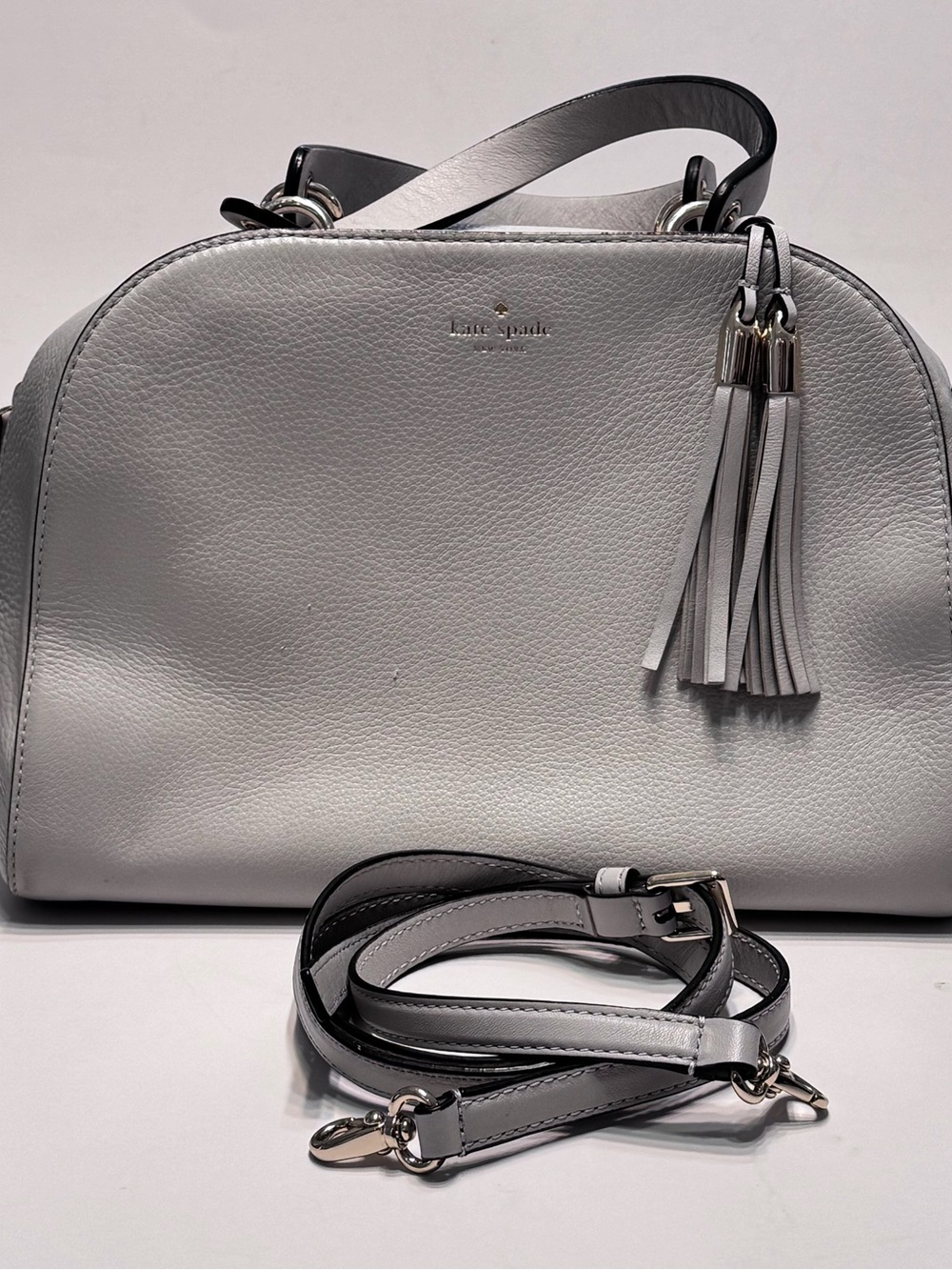kate spade Light Gray Pebbled Leather Satchel with Tassel Accent